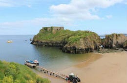 Tenby Island sitting in the beautiful blue sea