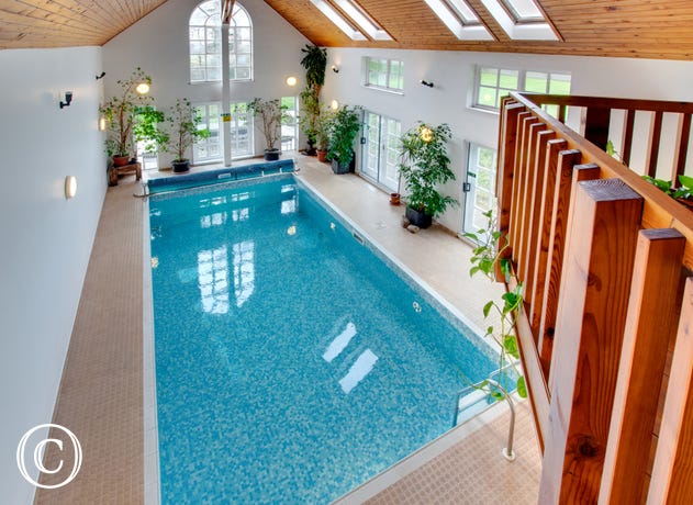 A super private indoor heated swimming pool with shower, toilet & sauna.