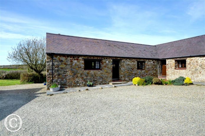 Shippon is an end cottage, set at right-angles to the other two, garden to the rear